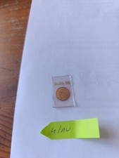 riproduzione di monete miniatura in oro