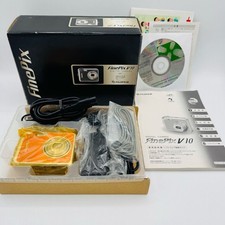 Fotocamera digitale arancione Fujifilm FinePix V10, accessori completi