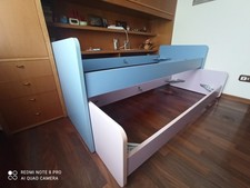 Letto salvaspazio con letti scorrevoli comprensive di reti ortopediche.