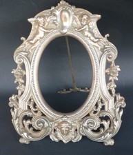 Cornice in metallo argentato