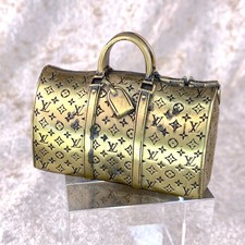 Louis Vuitton fermacarte LV