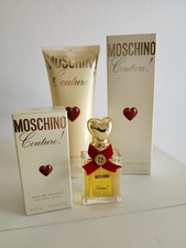 Moschino Couture!  0.8 oz /