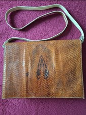 autentica Cobra leather clutch