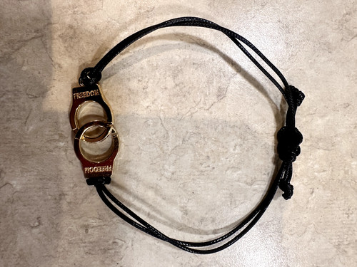 Bracciale libertà manetta - libertà,