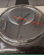 Orologio swatch da parete