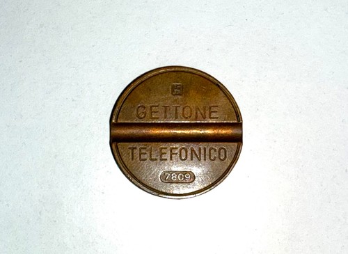 Gettone telefonico 7809 con - gettone,