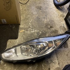 Faro proiettore anteriore lato