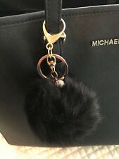 Portachiavi Charm per borsa. Pon pon pelliccia sintetica Nero e metallo dorato.