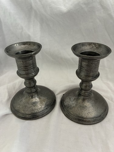 Two pewter candlesticks - two,