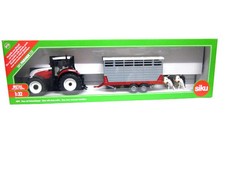 SIKU 1:32 DIE CAST  TRATTORE STEYR CON RIMORCHIO TRASPORTO MUCCHE ART 3870