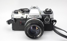 Olympus OM-10 + obiettivo