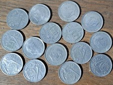 15 monete da 50 pesetas anno