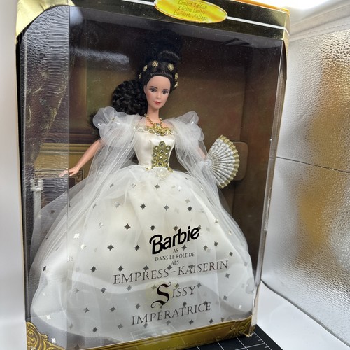 Barbie dans role - le, de