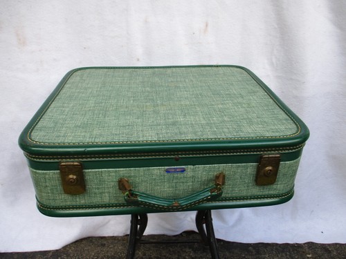 Valigia rigida verde vintage
