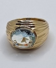 ANELLO A FASCIA CON TOPAZIO