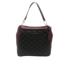 Borsa a spalla con stampa monogram, ampio scomparto chiuso con zip. Possiede...