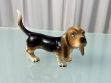 Statua uccellino Goebel cane