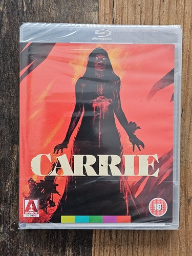 Carrie - , b)