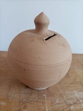 Salvadanaio in terracotta da