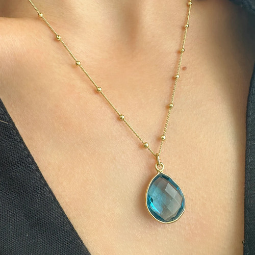 Collana con ciondolo topazio