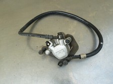 Front brake caliper line pads