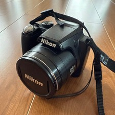 Nikon COOLPIX P90 fotocamera digitale compatta nera 12,1 MP 24x zoom testata