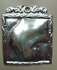 ex voto Ginocchio in metallo