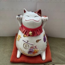 Statua gatto salvadanaio