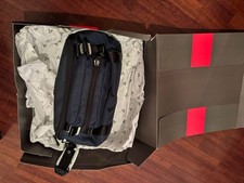 Borsello TUMI con modulo extra