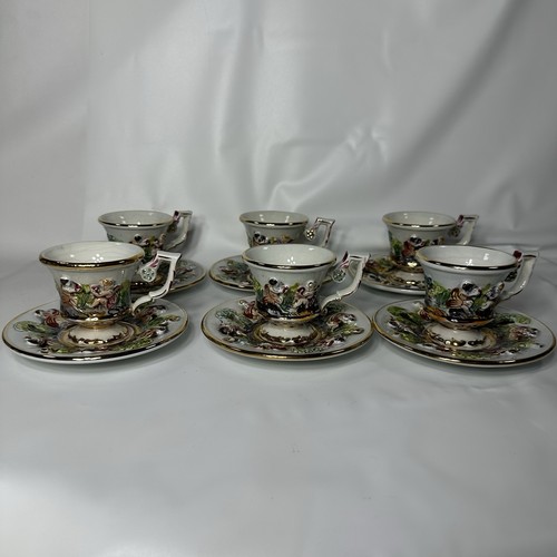 Set tazze piattini - e,