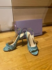 Scarpe decolletè con tacco