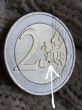 Moneta 2€ Austria 2011 con Eccesso di Conio sotto la E di EURO facciata comune