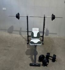 bilanciere con pesi e manubri