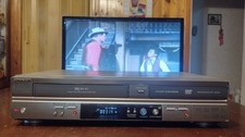 SHARP MASTERIZZATORE COMBO VHS DVD DV-RW360, 6 TESTINE STEREO CON TELECOMANDO