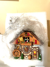 DEPT 56 NEGOZIO DI OROLOGI VILLAGGIO ALPINO 6007580