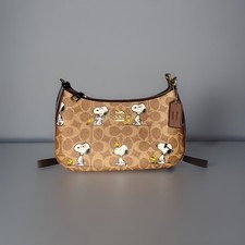 Coach peanuts snoopy - peanuts,