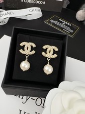 Chanel pearl earrings, light