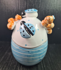 ceramica artigianale uovo con coccinelle e bruco lavorato a mano h cm 15 x 11 ø