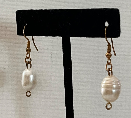 Orecchini pendenti con perle