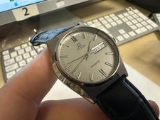 Orologio vintage titus quarzo quadrante grigio data giorno swiss made 35mm