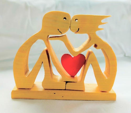 Statuetta legno uomo - di, +