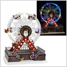 SCENA NATALIZIA VILLAGGIO GIOSTRE RUOTA PANORAMICA NATALE MOVIMENTO LUCI E SUONI