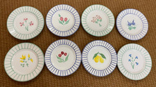 8 piatti decorativi