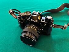 CANON AE-1 PROGRAM con CANON LENS FD 50  mm  1:1,4 con FLASH, ZOOM MACRO e acc.
