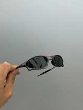 Occhiali da sole Oakley Penny & Juliet X-Mental montatura grigia/lenti nere