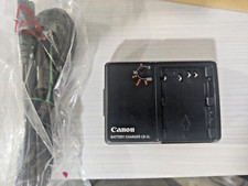 CARICABATTERIE ORIG. CB-5L Canon BP511 BP512 EOS-300D 10D 20D 30D D30 40D D60 5D