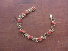 PARTICOLARE BRACCIALE ROSE CORALLO ROSSO E ORO 18 KT