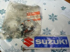 NOS SET PORTASPAZZOLE SUZUKI
