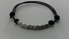 BRACCIALE CON PEPITE GRANELLI