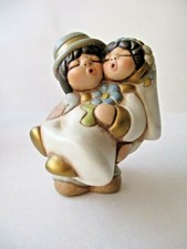 Thun coppia sposini con fiori